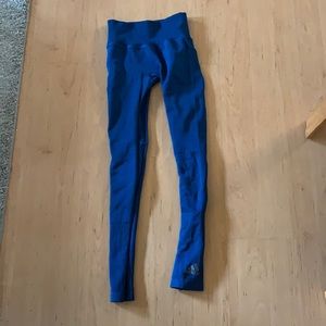 Teal Adidas leggings.